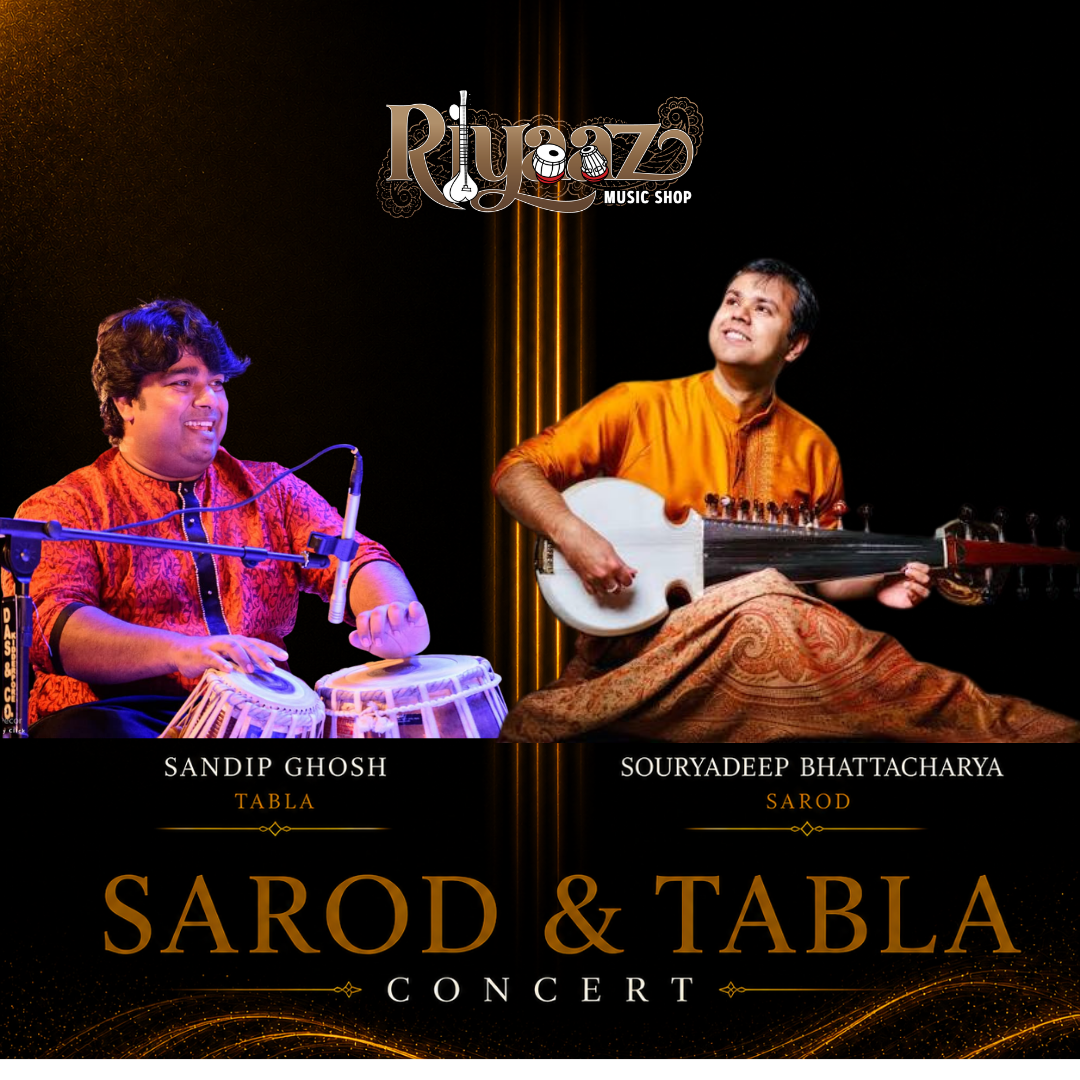
                  
                    Sandip Ghosh and Souryadeep Bhattacharya performing a Sarod and Tabla concert at Riyaaz Music Shop in Union City, California
                  
                